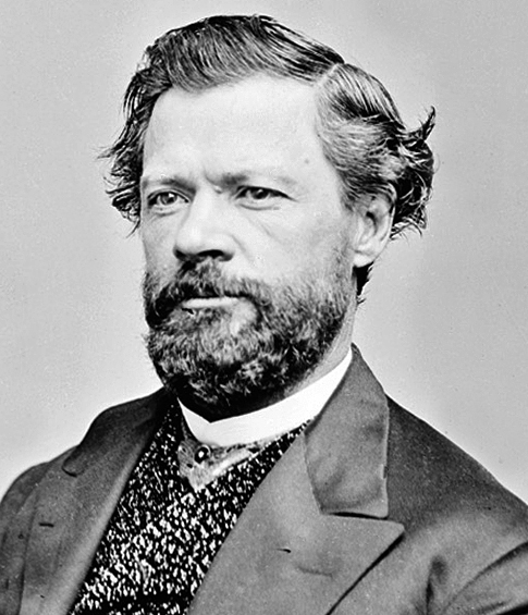 A studio photographic portrait identified as Charles D. Poston, a middle-aged man, bearded.