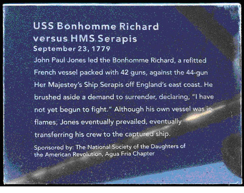 A snapshot of a plaque commemorating the battle of the USS Bonhomme Richard versus HMS Serapis. Marker text is in the body of this page.