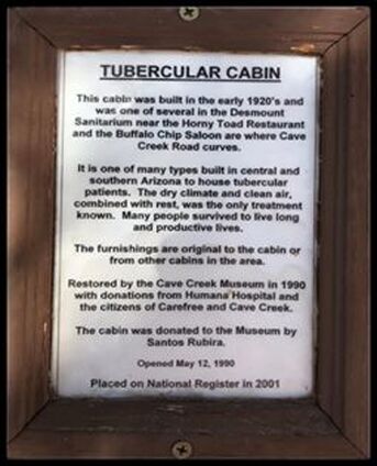 A snapshot of a framed sheet with information about the cabin. This information is in the body of this page.