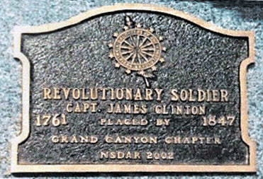 A snapshot of a marker that reads, “Revolutionary Soldier Capt. James Clinton / 1761 placed by 1847 / Grand Canyon Chapter, NSDAR 2002.”